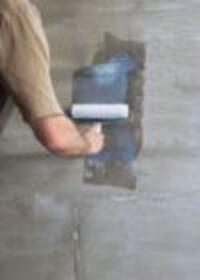 Applying PVA adhesive to ceramic wall tiles